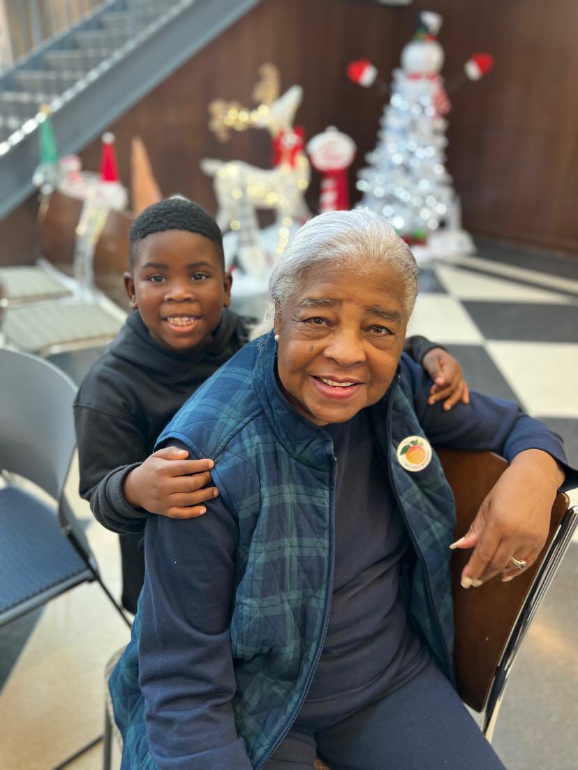 Older Adult and Child Smiling